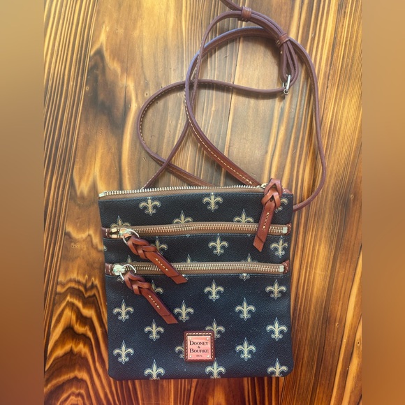 Dooney & Bourke Black and Tan Crossbody with Fleur-de-Lis - Picture 1 of 4